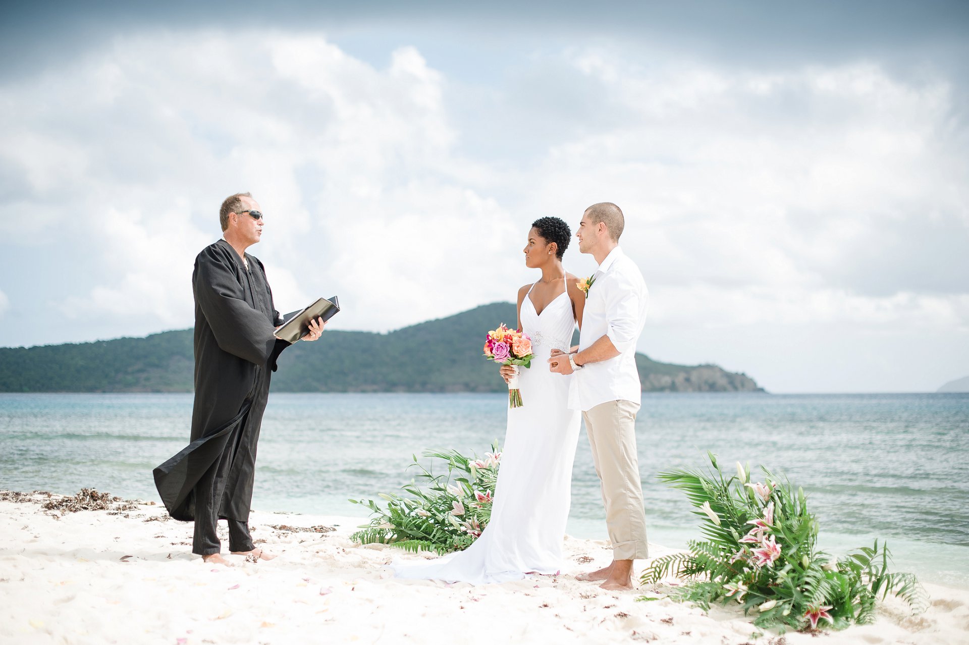 Destination wedding ceremony with Blue Sky Ceremony at Lindquist Beach, St. Thomas, USVI