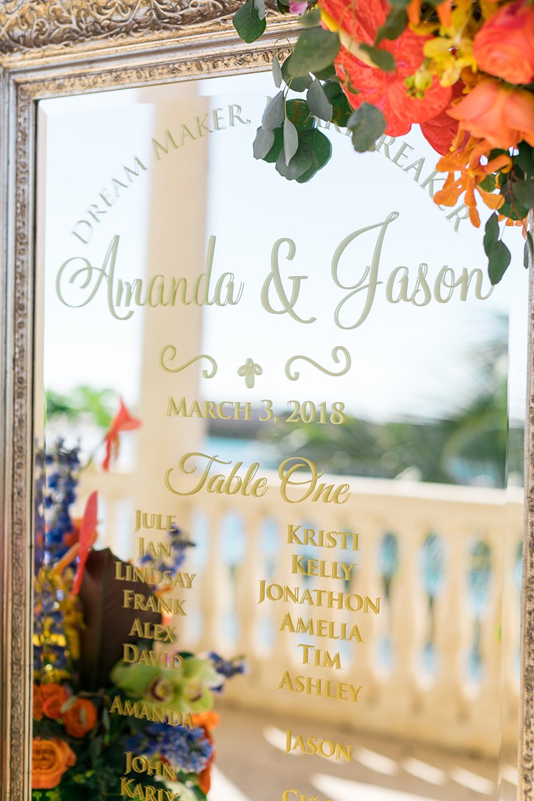 Gold mirrored seating chart at outdoor wedding in St. Thomas